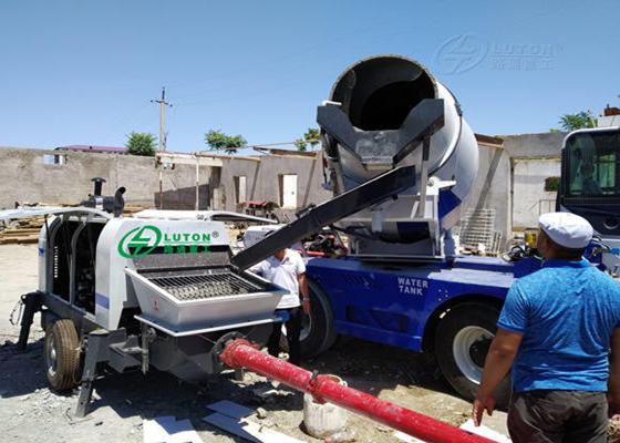 concrete mixer truck with a pump on site